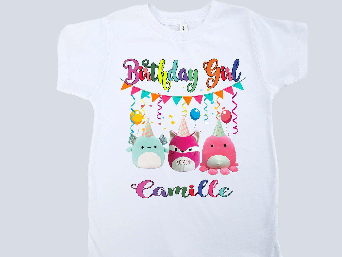A white Squishmallows birthday shirt with 'Birthday Girl' text and 3 squishmallows